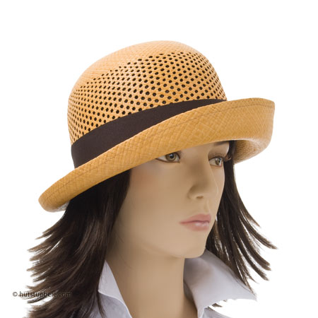 Unique lightly woman�s hat out of Panama with hole pattern and classic band
