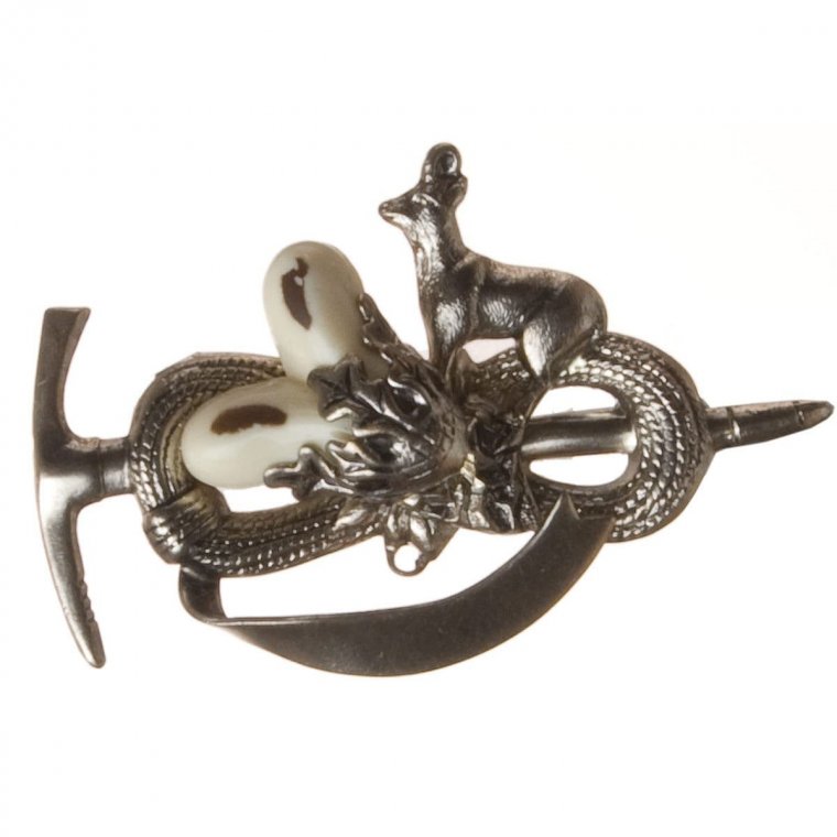 Pin for hats and coats in typical southtyrolean design